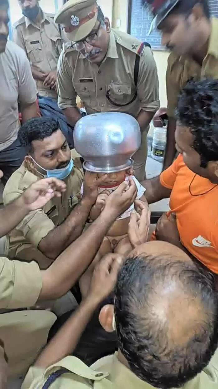 Pot stuck on head | കളിക്കുന്നതിനിടെ 2 വയസ്സുകാരന്റെ തലയില് പാത്രം കുടുങ്ങി: രക്ഷകരായി അഗ്നിരക്ഷാ സേന ഉദ്യോഗസ്ഥര്