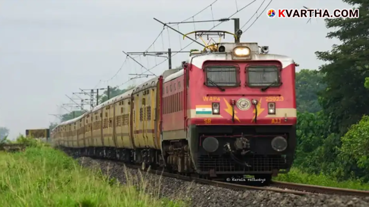 Maintenance workers performing repairs on a railway track near Palakkad.