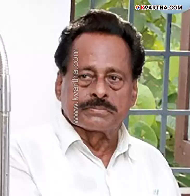 A black and white photo of veteran political leader K. Narayanan from Karivellur.