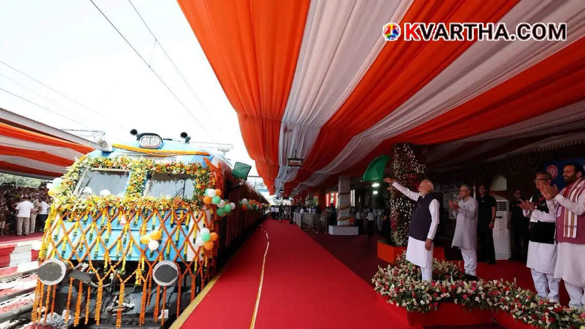 Prime Minister Narendra Modi officially flagging off a new train during a public event