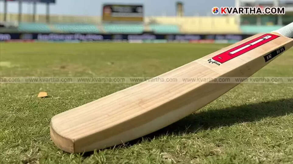 Cricket stadium in UAE with flags in the background.