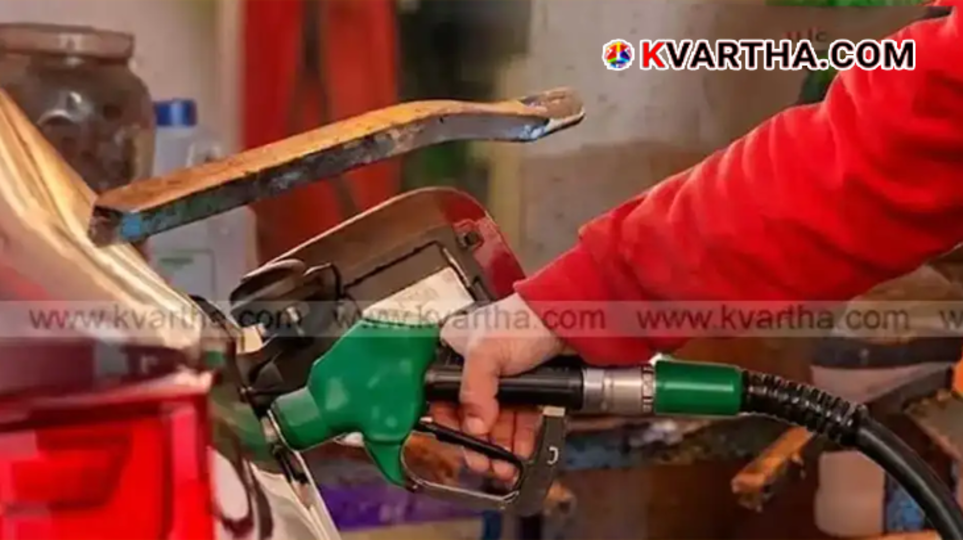 A fuel nozzle at a petrol pump representing the potential price hike in India.