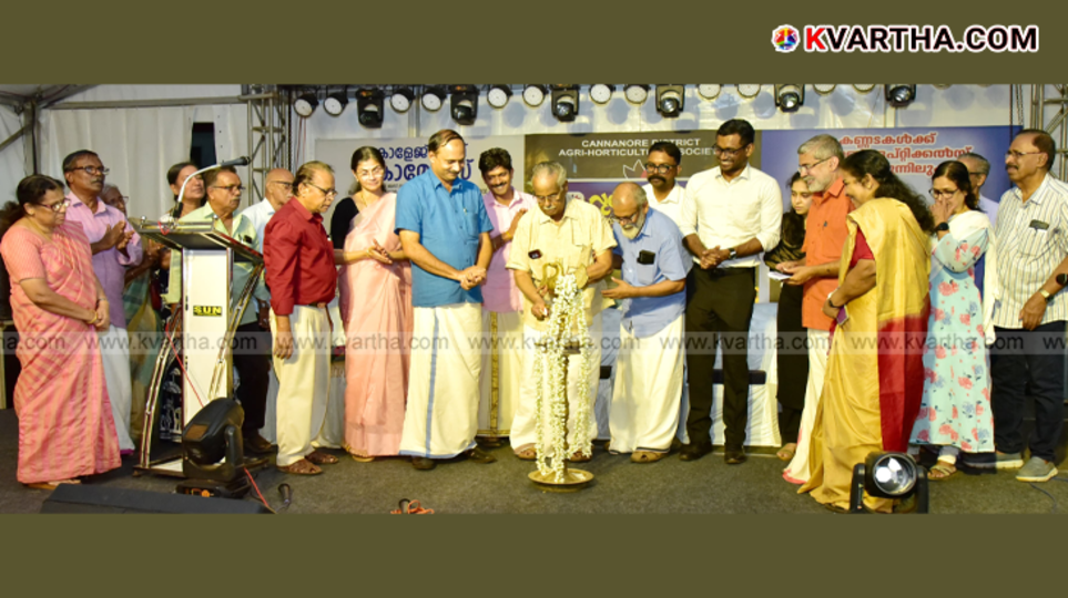 T. Padmanabhan lighting the lamp at Kannur Flower Show inauguration.