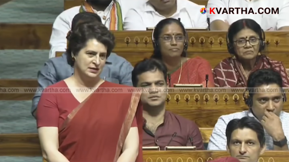 Priyanka Gandhi addressing a public gathering, criticizing Prime Minister Narendra Modi.