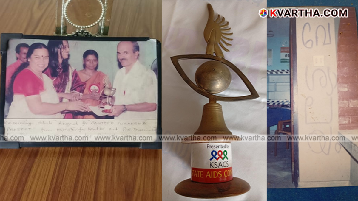 Kookanam Rahman receiving the State AIDS Control Society Award from PK Sreemathy Teacher.