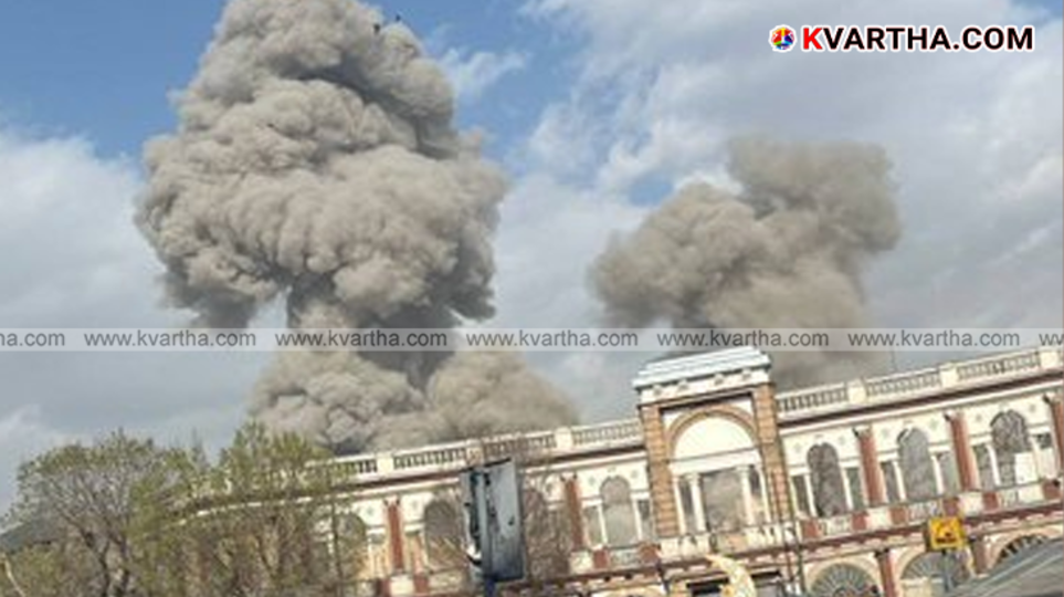 Visual of missiles and interceptions over a lit city at night.