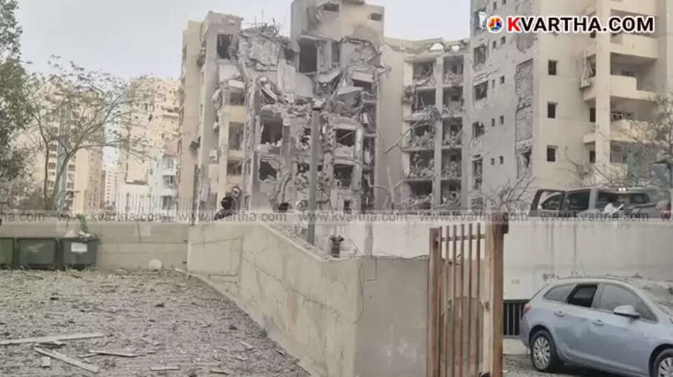 Damaged building in southern Israel after an Iranian missile attack, highlighting the ongoing conflict and failed ceasefire.