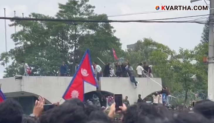 Young protesters holding placards during a protest in Kathmandu, Nepal.