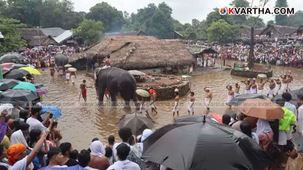 Swollen Bavali River with strong undercurrents near Kottiyoor temple due to heavy rain.