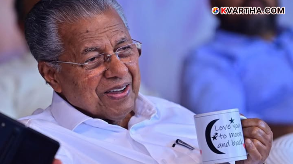 CM Pinarayi Vijayan holding a tea cup with message