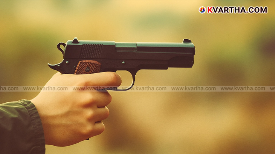 Police officers investigating a crime scene in Bihar where a shooting occurred due to a family dispute.