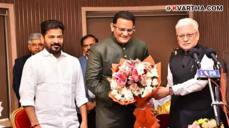 Mohammed Azharuddin taking the oath as a Telangana Minister at Raj Bhavan.