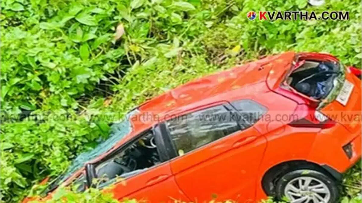  Car fallen into a deep gorge beside the road in Parassinikkadavu.