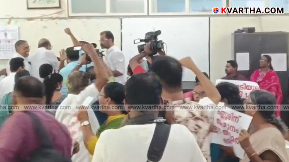 Kannur Corporation Council members protesting inside the council hall.