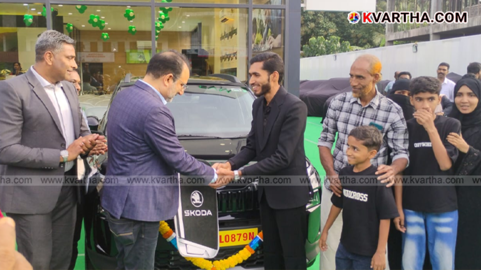 Muhammad Siyad receiving keys to his new Skoda car.