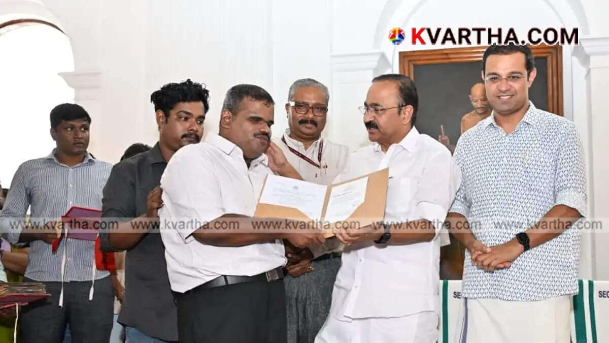 Image representing Chief Minister V D Satheesan handing over appointment orders to assistant professors