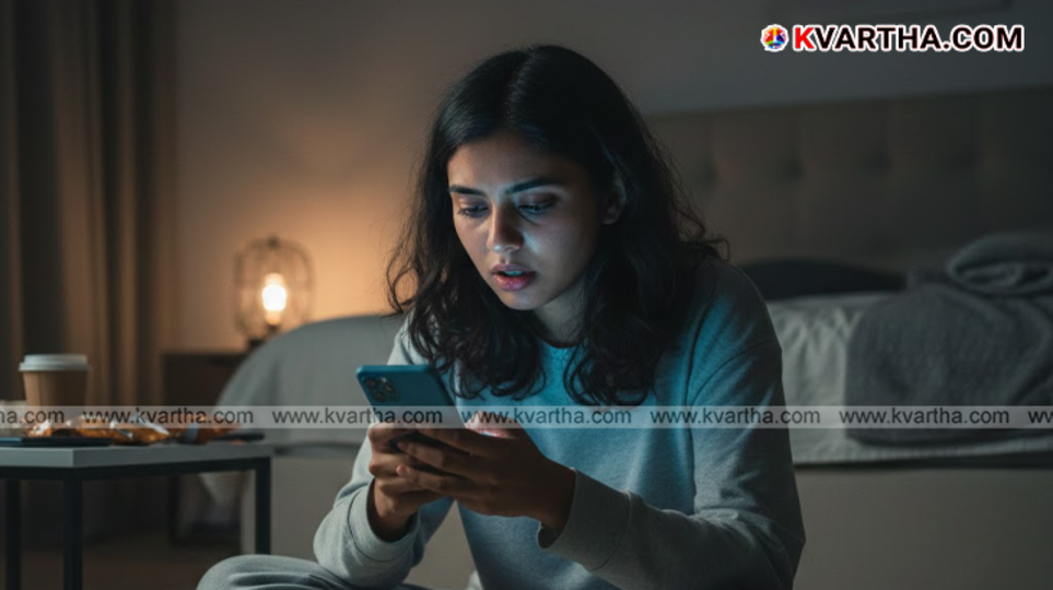  A person looking tired while scrolling through their smartphone at night.