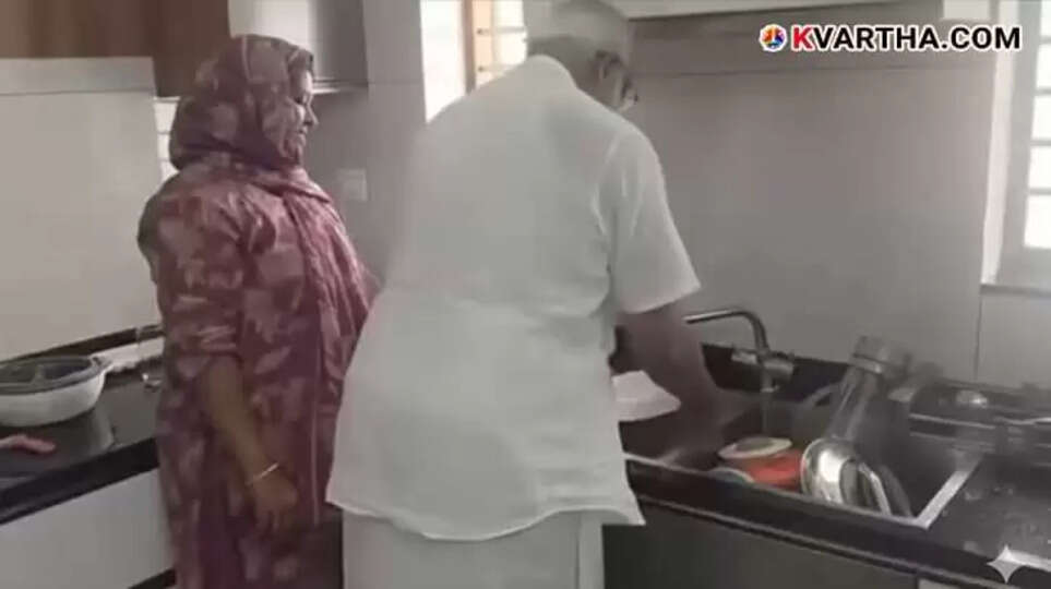 Person washing dishes representing mindfulness and responsibility.