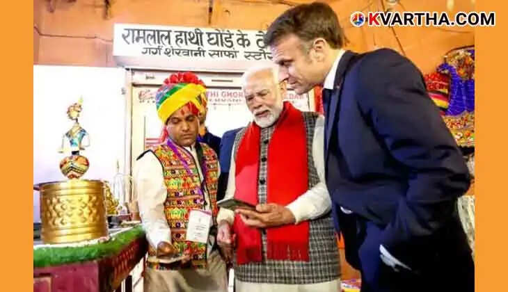  PM Modi explains the UPI digital payments system to French President.