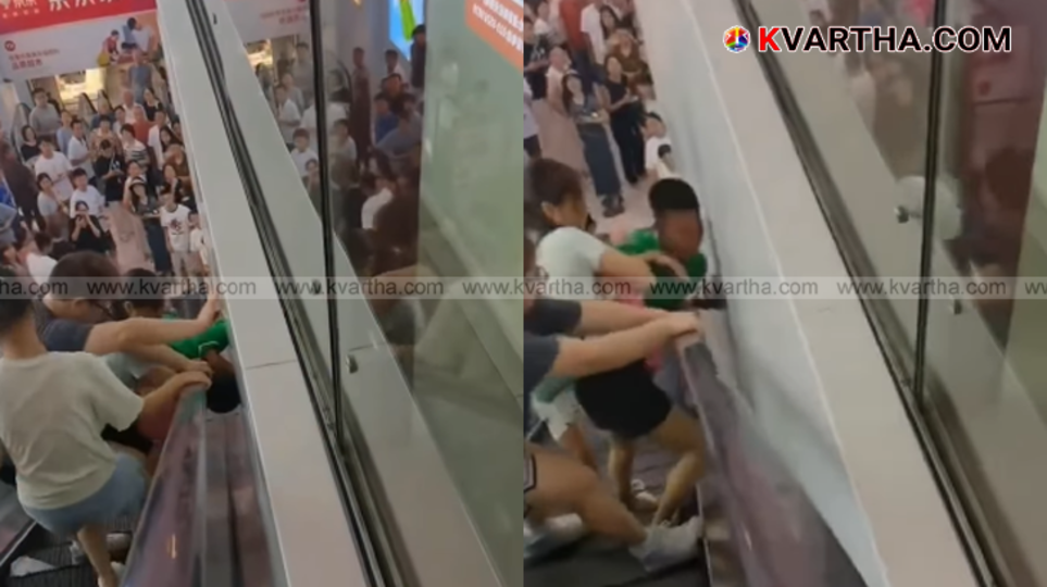 Still from a viral video showing a child's head trapped in an escalator.