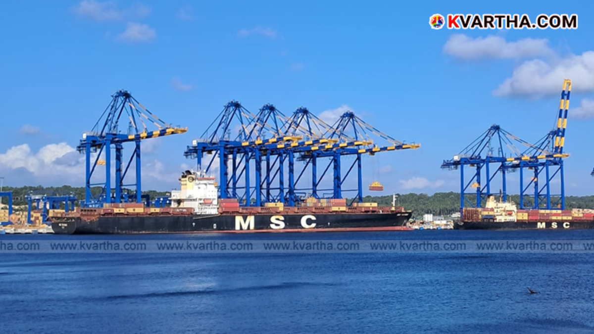 Aerial view of Vizhinjam International Seaport with containers and ships.
