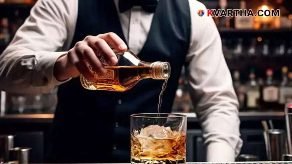 Person pouring alcohol with a caution sign in the background