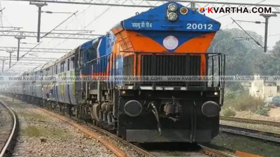 A South Indian express train engine entering a station in the Malabar region.
