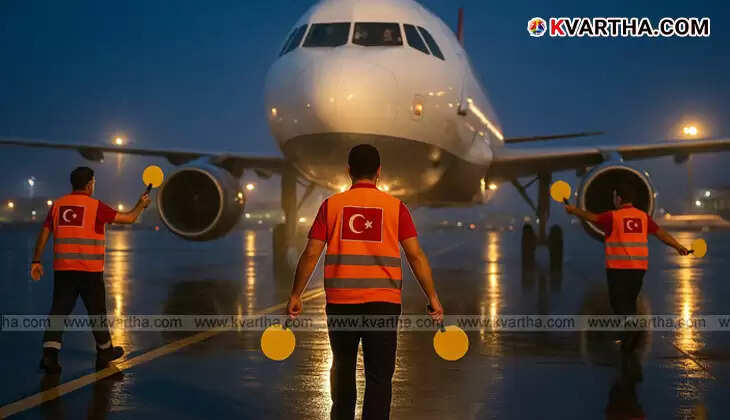 A Celebi Ground Handling worker near an airplane at an Indian airport