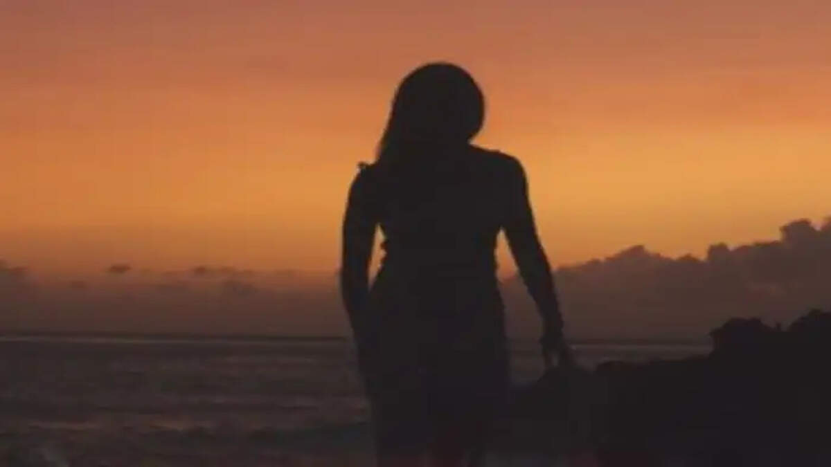 woman standing alone