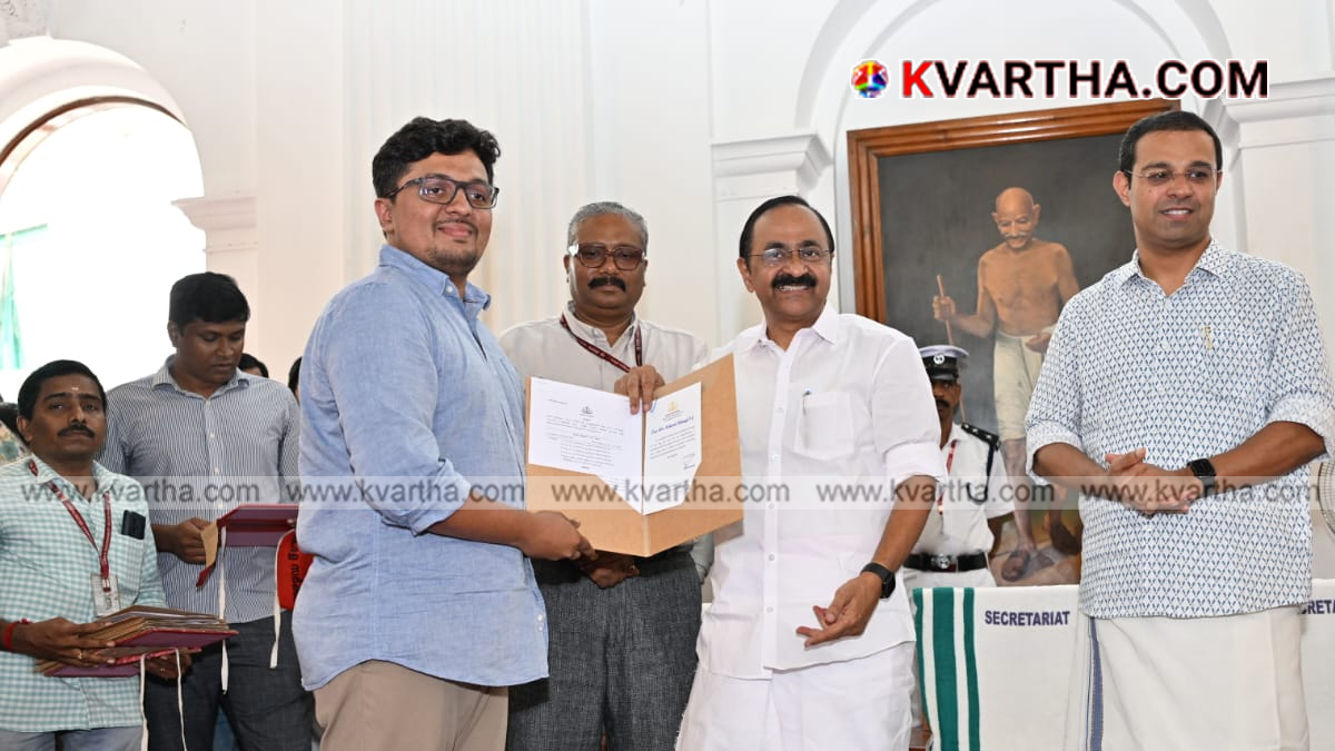 Image representing Chief Minister V D Satheesan handing over appointment orders to assistant professors