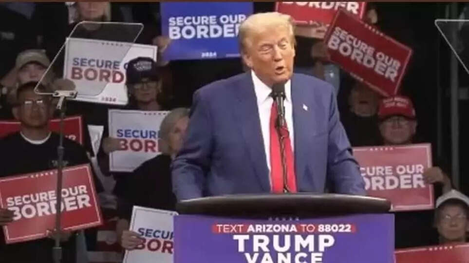 Man arrested with two guns near Trump rally