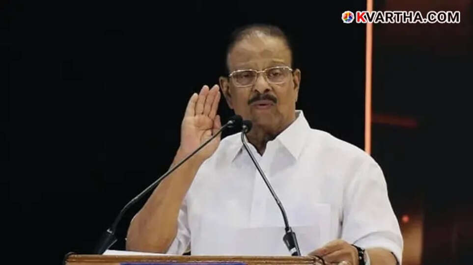 K Sudhakaran speaking at a political event.