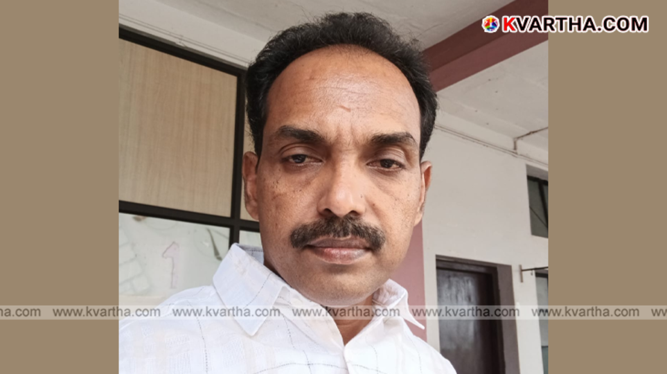 Adv. Kulathoor Jaisingh speaking to media or a legal portrait.