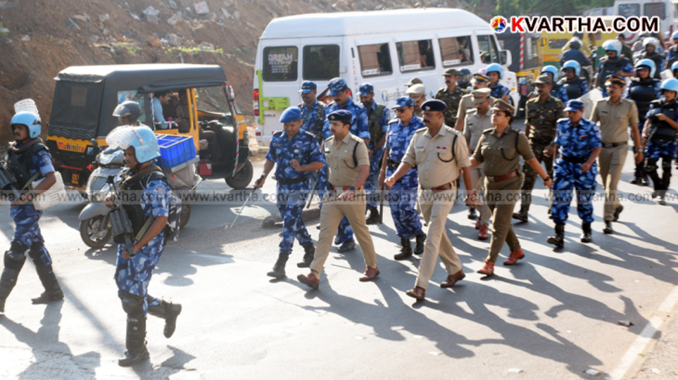 Police and RAF joint route march in Kannur for local election security