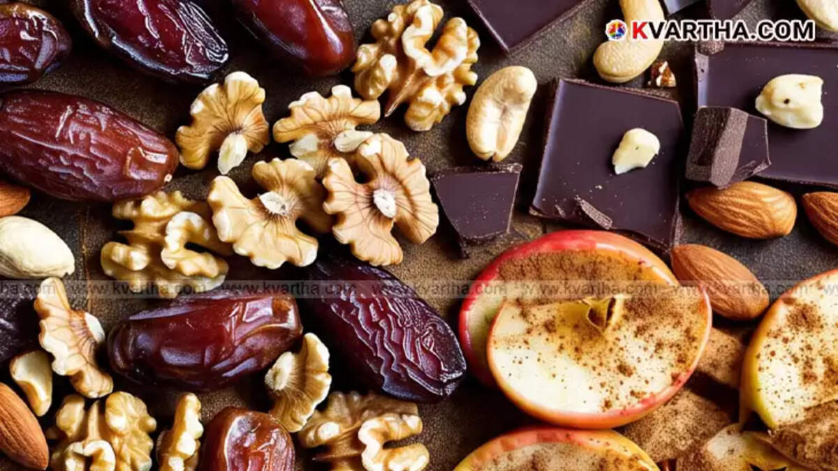  Assortment of healthy snacks like dates, walnuts, dark chocolate, and berries.