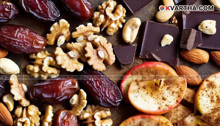 Assortment of healthy snacks like dates, walnuts, dark chocolate, and berries.