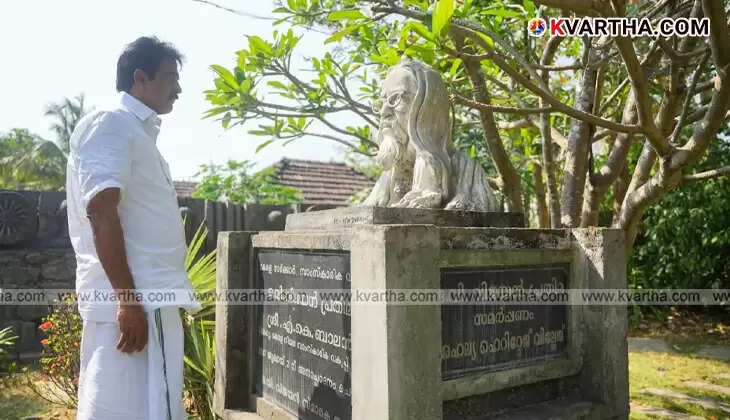 KC Venugopal listening to farmers in a paddy field in Palakkad.