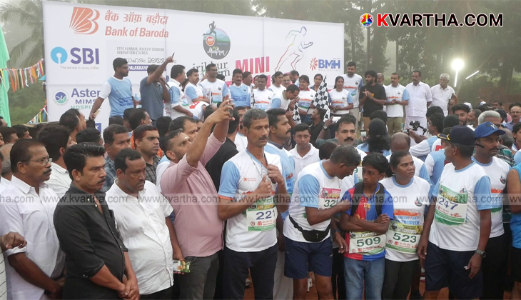 K.P. Mohanan MLA flagging off the mini marathon in Kannur.