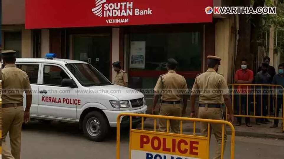 Representational Image of Police vehicle and officers near the South Indian Bank in Vizhinjam.