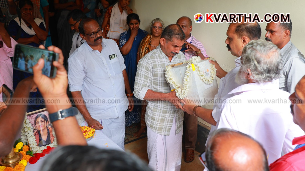  Image reflecting the handing over of Devika's ashes to her family in Iritty