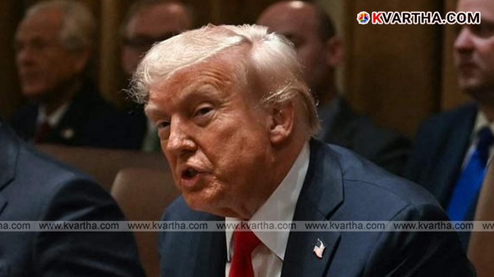 Donald Trump speaking at an event in front of a US flag.