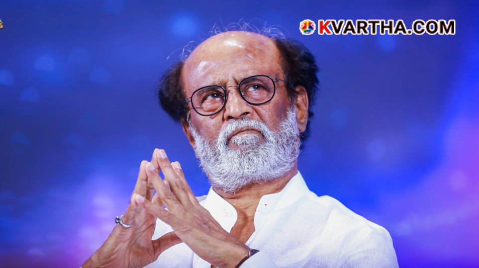 Superstar Rajinikanth folding hands and smiling at the media at Chennai airport.