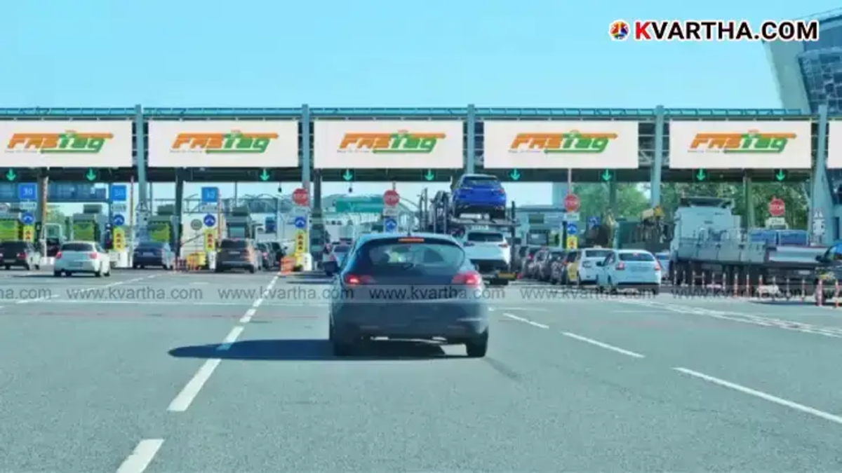 An image showing an automated free-flow tolling system on a highway.