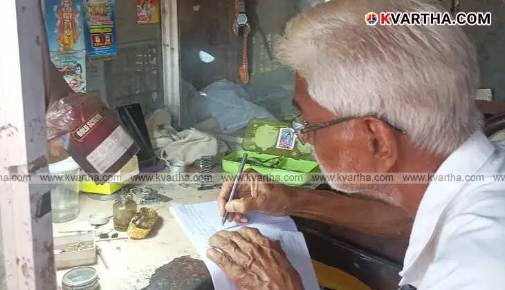 Narayanan working on a watch at his small shop in Pallikkovval.