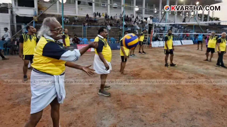  Minister Ramachandran Kadannappally serving the ball at the anti-drug friendly volleyball match.