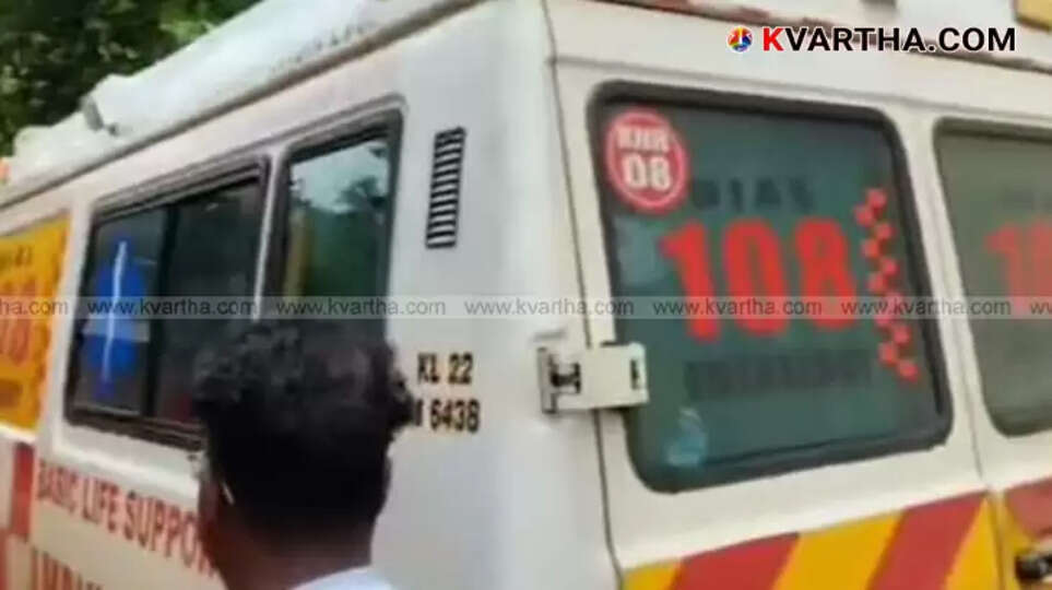 A long line of vehicles stuck in heavy traffic on a narrow road, symbolizing the gridlock in Kottiyoor.