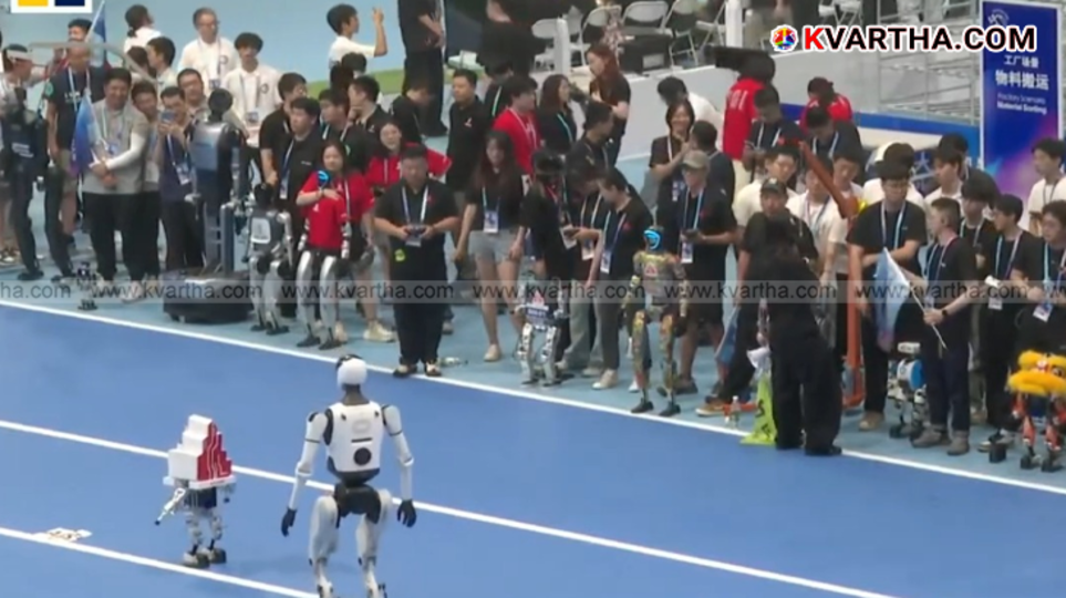 Humanoid robots playing football at the World Humanoid Robot Games in Beijing.
