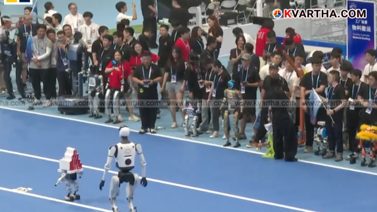 Humanoid robots playing football at the World Humanoid Robot Games in Beijing.