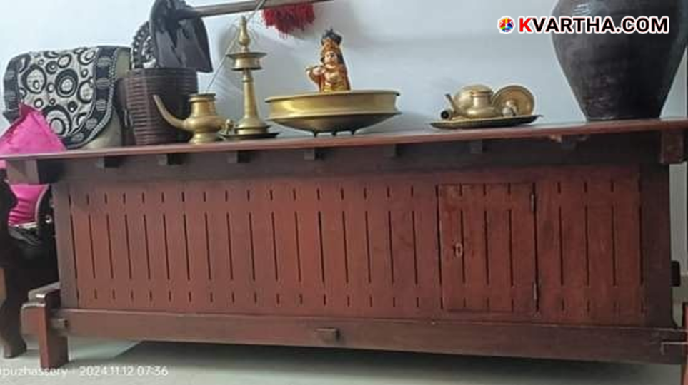  A traditional wooden granary known as Pathayam in an old Kerala household.