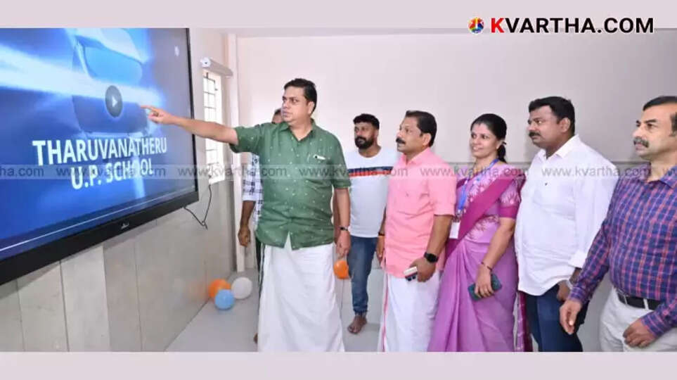 Kerala Speaker A.N. Shamseer speaking at the inauguration of a smart classroom at Kathirur UP School.